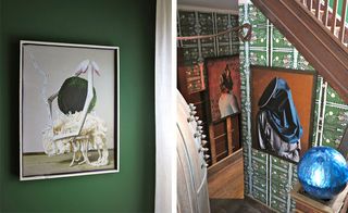 The front foyer features the artist's photographs along with wallpaper designed especially by him for the house