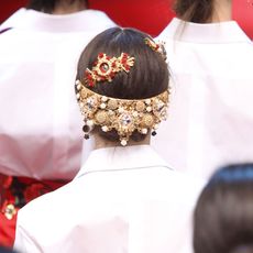 Hairstyle, Headgear, Tradition, Fashion accessory, Costume accessory, Fashion, Temple, Ceremony, Headpiece, Hair accessory, 