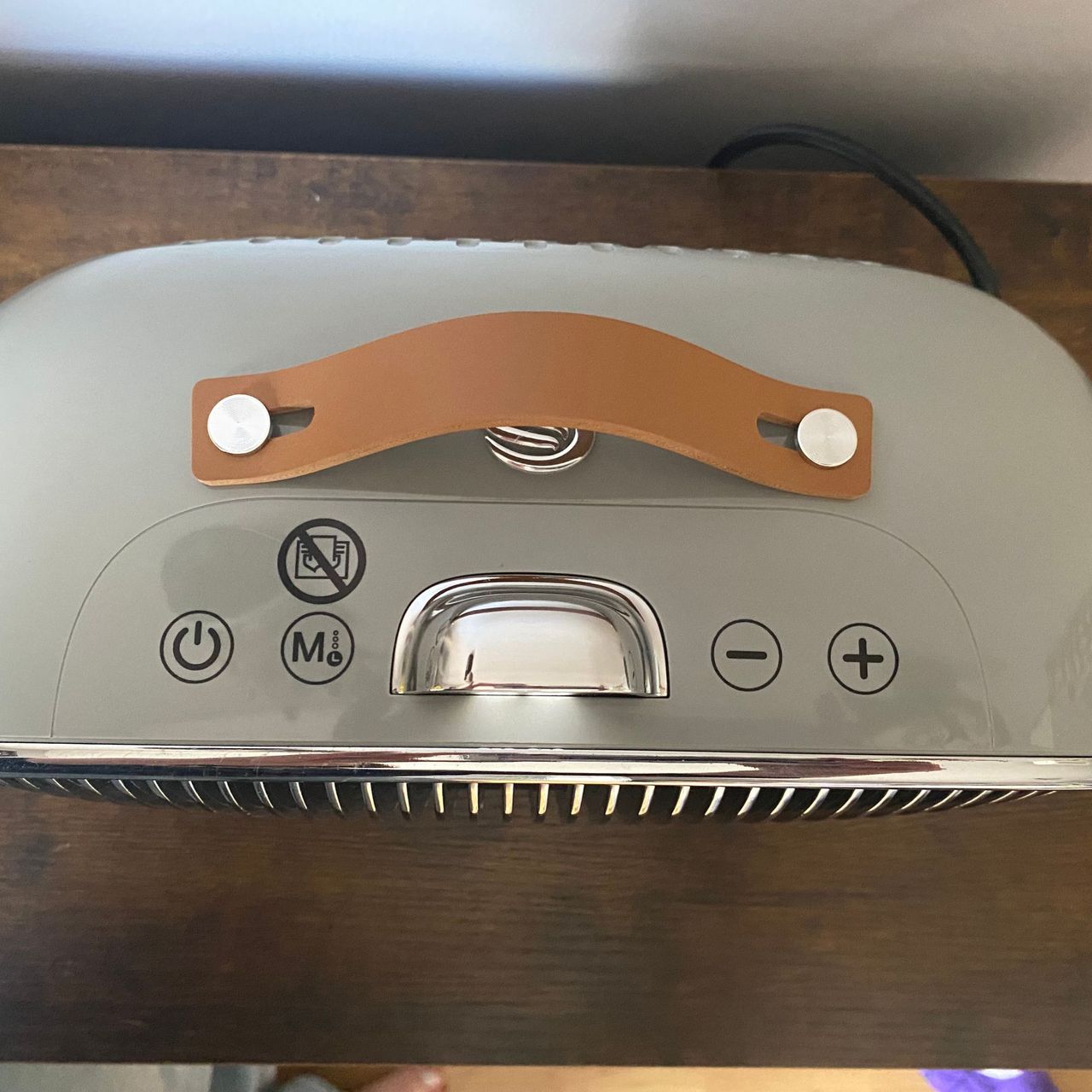 Top view of the Swan 1.5kW Retro Ceramic Heater with control panel and leather carry handle