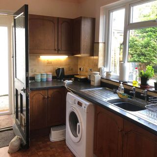 kitchen with drawers and wooden flooring