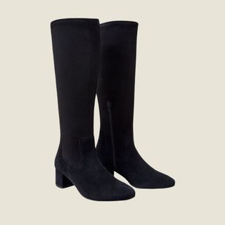 flat lay image of knee high boots