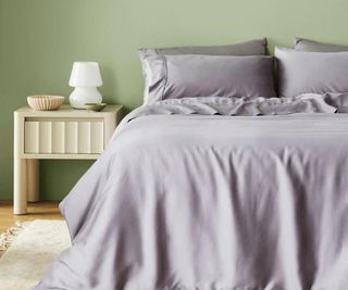 Ettitude Signature Sateen Duvet Cover on a bed.