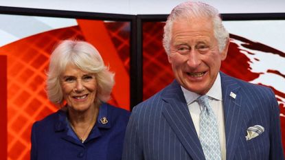 Prince Charles, Prince of Wales and Britain's Camilla, Duchess of Cornwall talk with BBC Afghan Senior Presenter Sana Safi during their visit to the BBC World Service, in London, on April 28, 2022, for its 90th anniversary. - During the visit the royal couple thanked staff and learn how BBC journalists are continuing their operations across Ukraine, Russia and Afghanistan. 