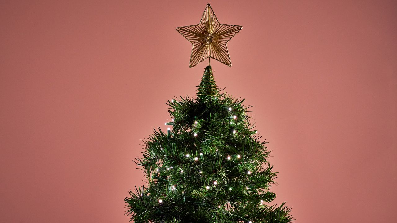 The Govee Christmas Sparkle String Lights are glowing white on a Christmas tree.