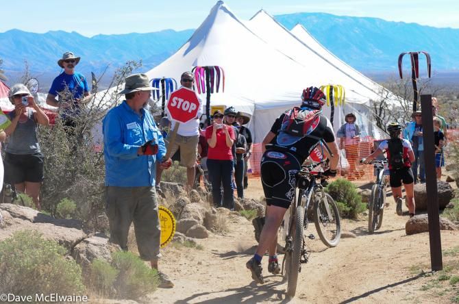 Riders dismounting as they entered the big tent to hand the baton off their team-mates