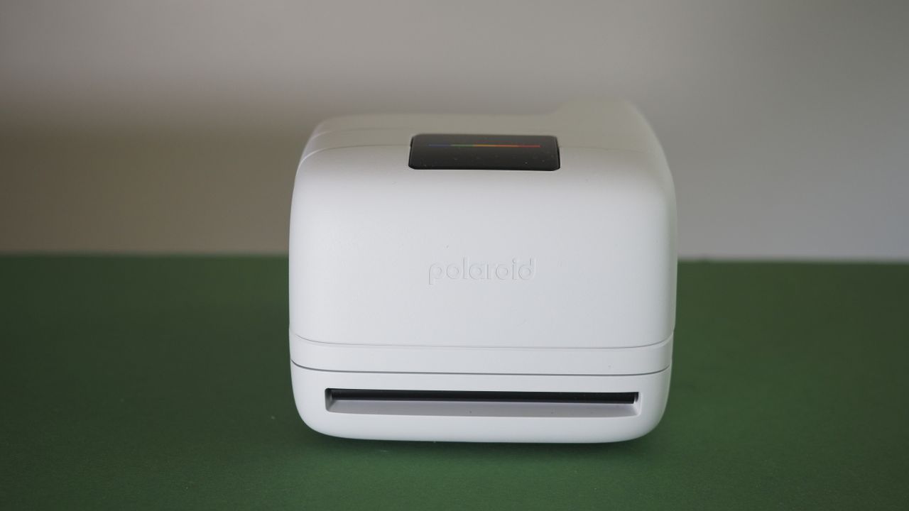 Polaroid Flip camera on a green surface