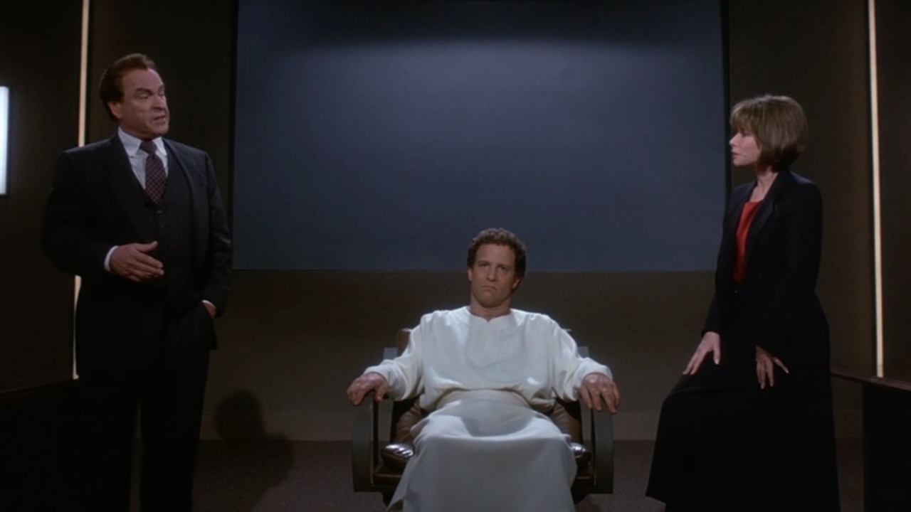 Albert Brooks at his hearing in Defending Your Life