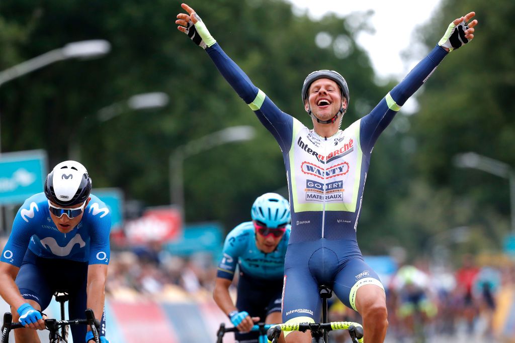 HOOGERHEIDE NETHERLANDS SEPTEMBER 01 Taco Van Der Hoorn of Netherlands and Team Intermarch Wanty Gobert Matriaux celebrates at finish line as stage winner ahead of LR Mathias Norsgaard Jrgensen of Denmark and Movistar Team and Samuele Battistella of Italy and Team Astana Premier Tech during the 17th Benelux Tour 2021 Stage 3 a 1683km stage from Essen to Hoogerheide BeneluxTour on September 01 2021 in Hoogerheide Netherlands Photo by Bas CzerwinskiGetty Images