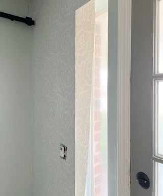 Wrapping peel and stick wallpaper around window