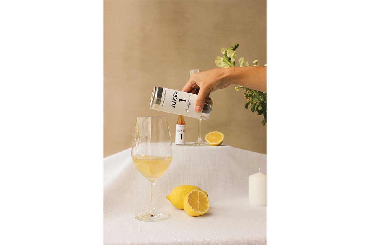 Cordialities&amp;rsquo; Jukes 1,being pouted into glass, lemons on table