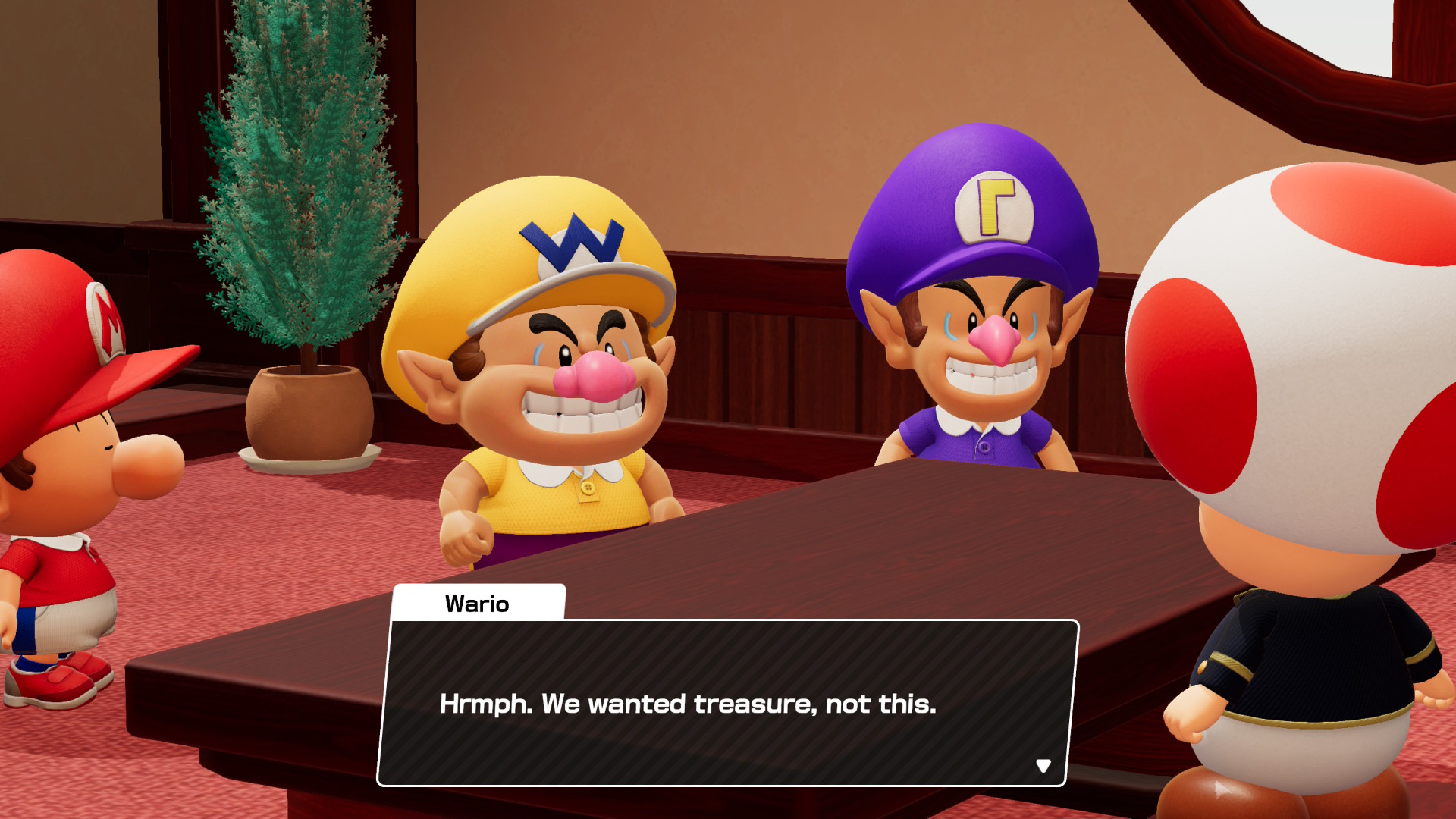 Baby Wario is annoyed he's become a baby in Mario Tennis Fever