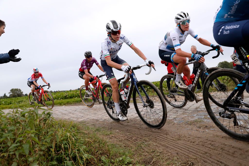 ROUBAIX FRANCE OCTOBER 02 Marta Cavalli of Italy and Team FDJ Nouvelle Aquitaine Futuroscope and Ellen Van Dijk of Netherlands and Team Trek Segafredo compete through cobblestones sector during the 1st ParisRoubaix 2021 Womens Elite a 1164km race from Denain to Roubaix ParisRoubaixFemmes ParisRoubaix on October 02 2021 in Roubaix France Photo by Bas CzerwinskiGetty Images