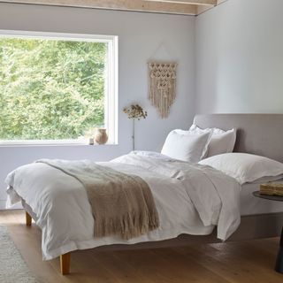 White bedding in a white bedroom