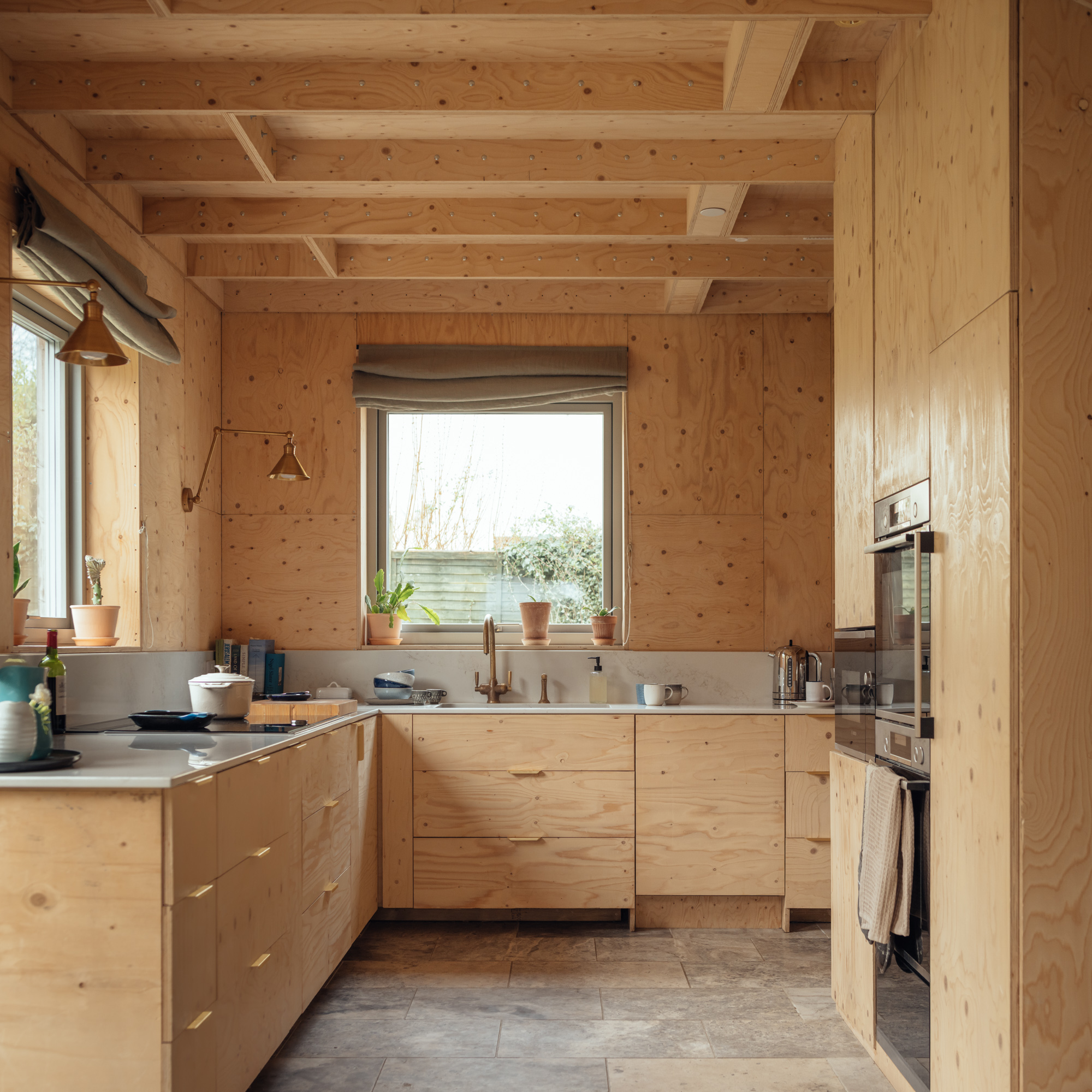 At ground floor level the new extensions houses a timber kitchen