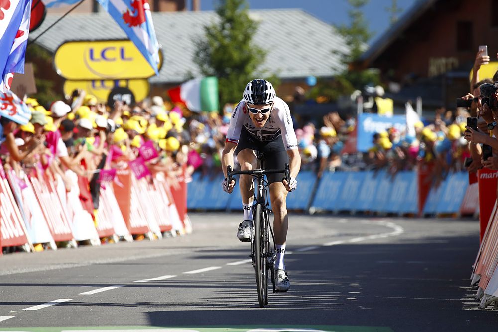 Geraint Thomas (Team Sky) makes a run for the finish line to take stage 11 victory and the yellow jersey a the Tour de France