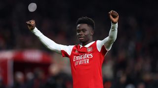 Bukayo Saka celebrates after Arsenal's 3-2 win over Manchester United in the Premier League in January 2023.
