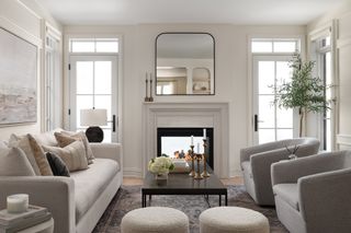 neutral living room with indoor outdoor fireplace