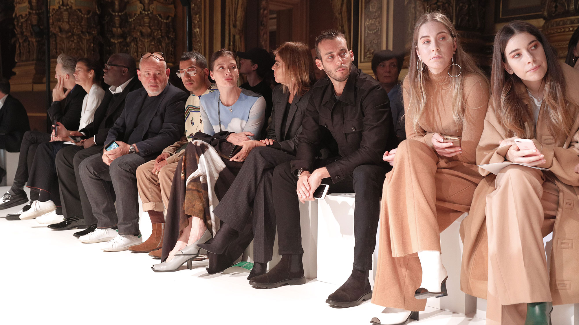 Celebrities sit front row at Paris Fashion Week