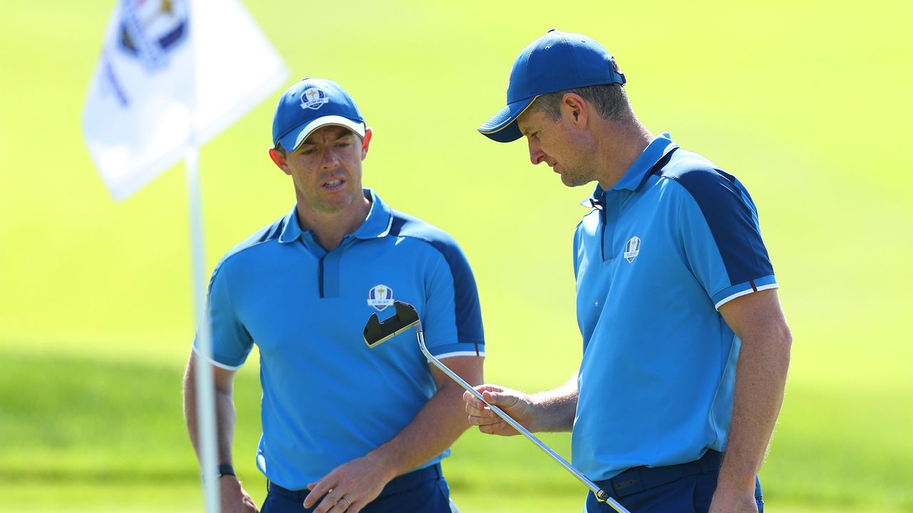 Justin Rose looking at his putter