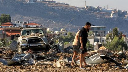 The wreckage following an Israeli airstrike in Jiyeh, Lebanon