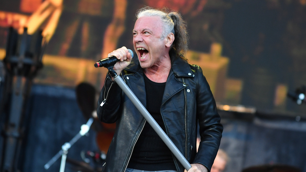 Bruce Dickinson singing on stage