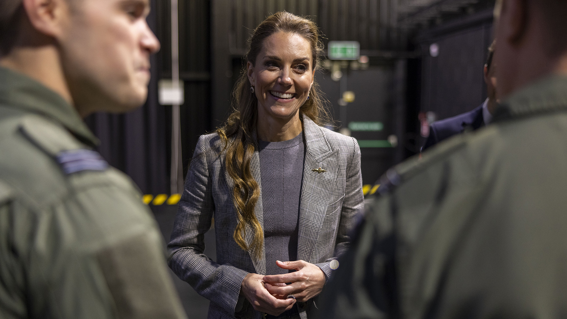 CONINGSBY, ENGLAND - OCTOBER 2: Catherine, Princess of Wales, Royal Honorary Air Commodore, meets Quick Reaction Alert personnel based at RAF Coningsby in Lincolnshire during her first official engagement at the station, on October 2, 2025 in Coningsby, England. During the visit, Her Royal Highness learned about the station's operational role, met Quick Reaction Alert personnel, viewed a Typhoon aircraft, and toured the new Typhoon Future Synthetic Training facility, and also met families of personnel serving at the base. (Photo by James Glossop - WPA Pool/Getty Images)
