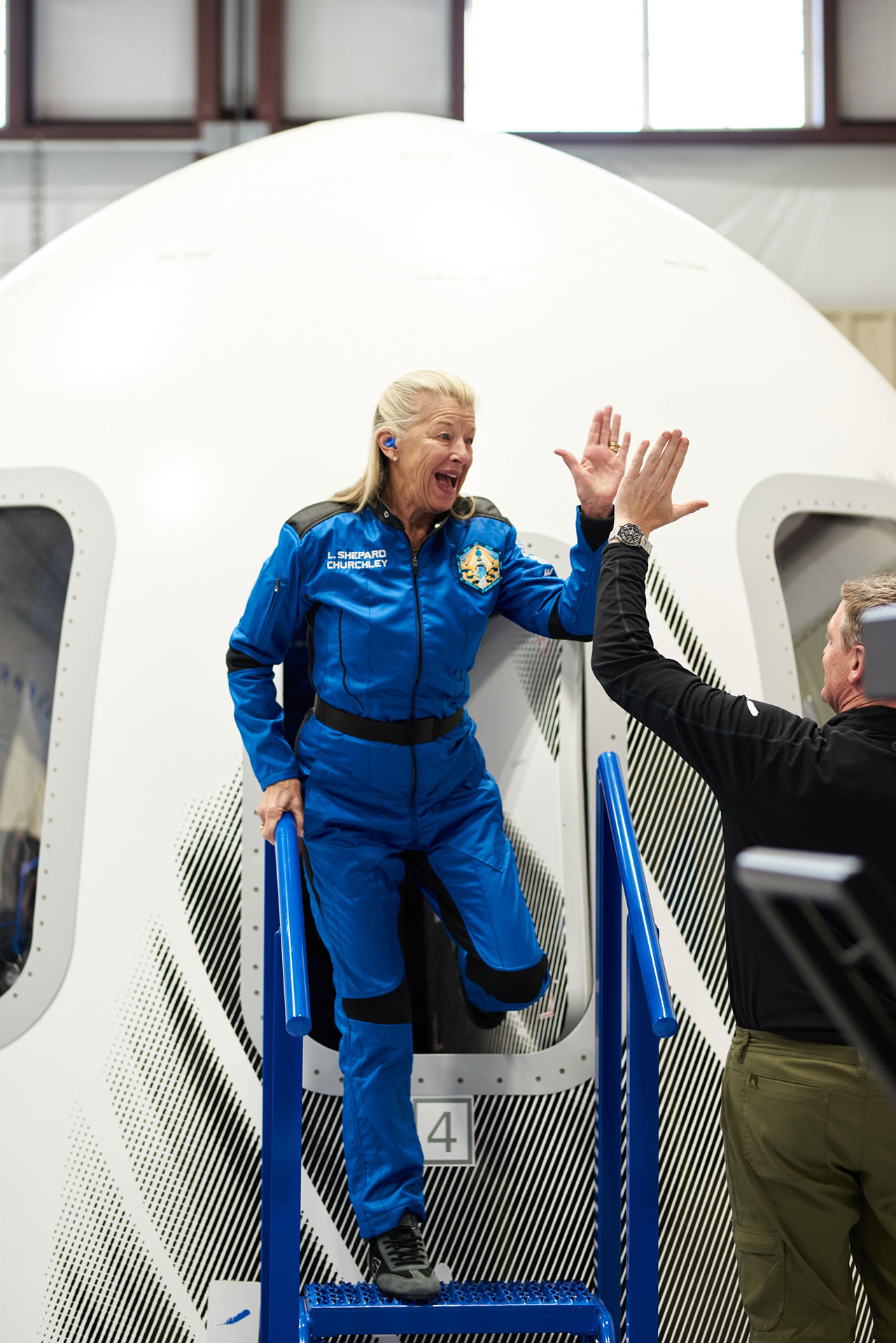 Laura Shepard Churchley exits Blue Origin's New Shepard capsule simulator after a training run prior to her spaceflight.