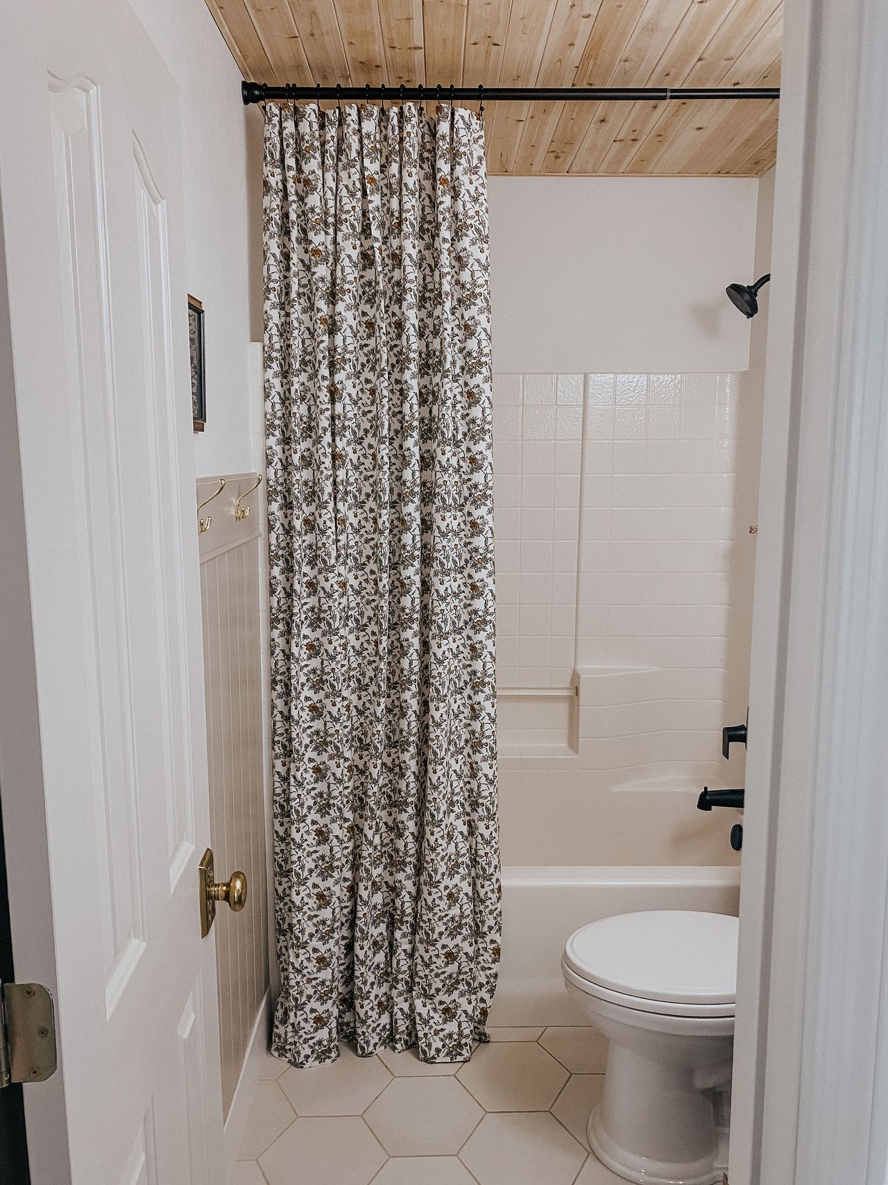 I DIYed a long shower curtain using a flat bed sheet | Real Homes