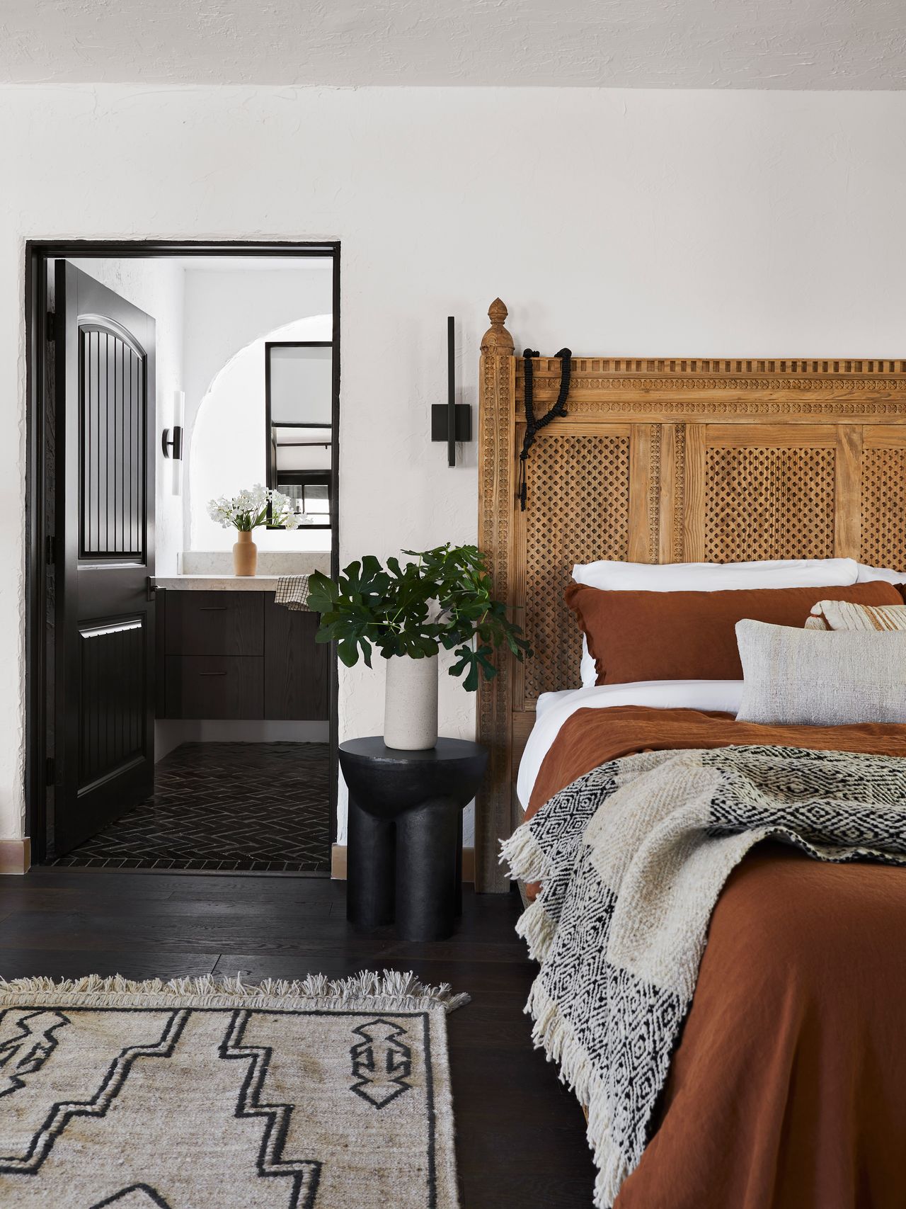 a rustic bedroom with an ensuite