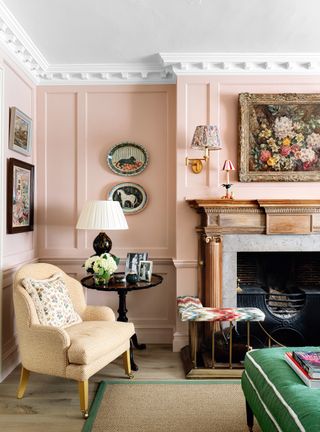 Pink living room with fireplace and club fender