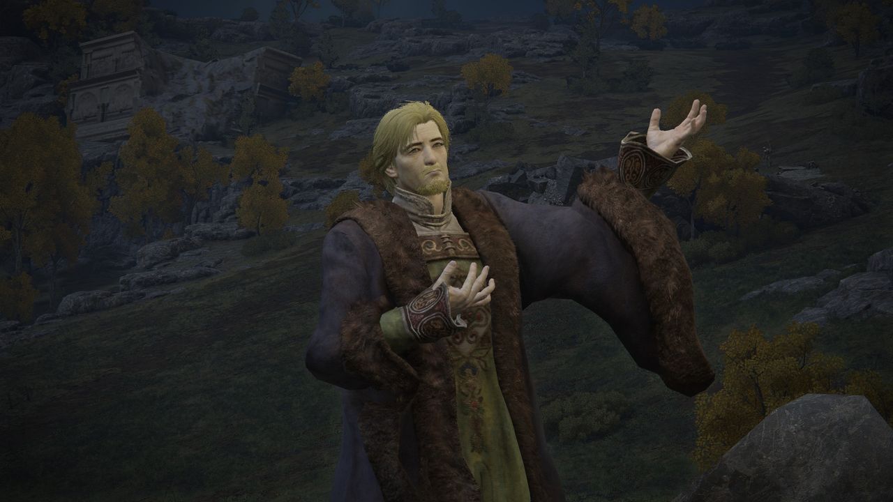 Elden Ring - Kenneth Haight stands in the Mistwood holding his hand in the air as he talks.