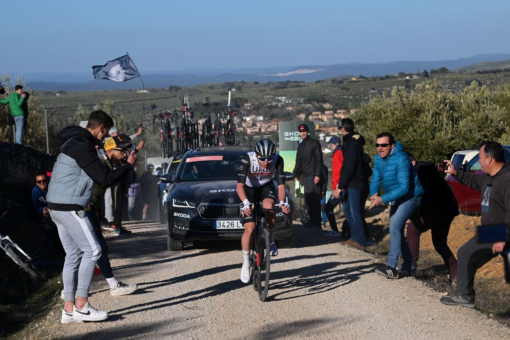 BAEZA SPAIN FEBRUARY 13 Tadej Pogacar of Slovenia and UAE Team Emirates competes in the breakaway on a gravel road compete while fans cheers during the 2nd Clasica Jaen Paraiso Interior 2023 a 1789km one day race from beda to Baeza 752m ClsicaJan23 on February 13 2023 in Baeza Spain Photo by Dario BelingheriGetty Images