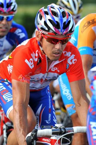 Robbie McEwen (Katusha) in the red jersey