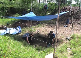 University of Pennsylvania student Whittaker Schroder (right) and Brown University bioarchaeologist Andrew Scherer (left) excavate in the Maya ballcourt.