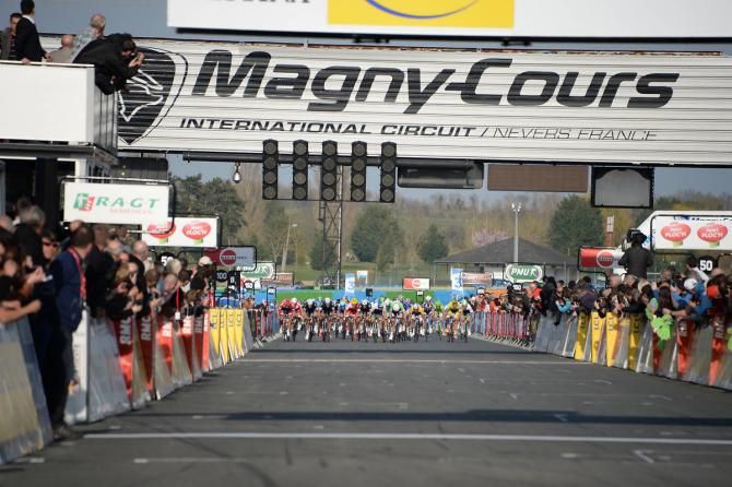 The peloton barrels to the finish line