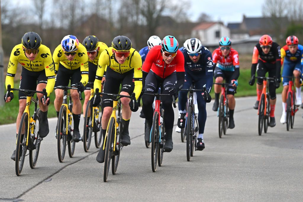 NINOVE BELGIUM FEBRUARY 24 Edoardo Affini of Italy Wout Van Aert of Belgium Matteo Jorgenson of The United States and Team Visma Lease A Bike and Arnaud De Lie of Belgium and Team Lotto Dstny compete in the breakaway during the 79th Omloop Het Nieuwsblad 2024 Mens Elite a 2022km one day race from Ghent to Ninove UCIWT on February 24 2024 in Ninove Belgium Photo by Luc ClaessenGetty Images