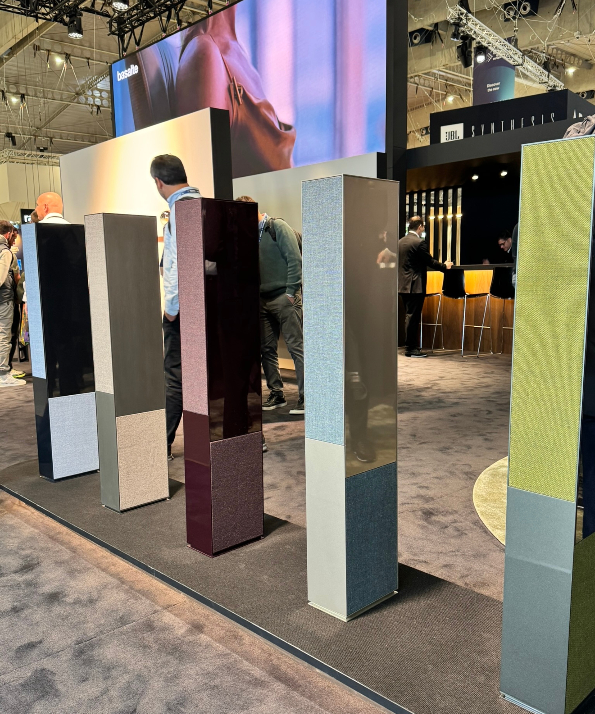 Colorful Basalte speakers in a row on display at ISE Barcelona 2026.