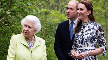 Kate Middleton and Prince William standing beside the Queen at the Chelsea Flower Show