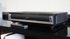 Hisense PX3-Pro UST projector on a table