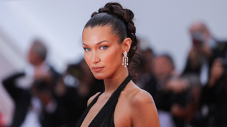 Bella Hadid attends the "L'Amour Ouf" (Beating Hearts) Red Carpet at the 77th annual Cannes Film Festival at Palais des Festivals on May 23, 2024 in Cannes, France