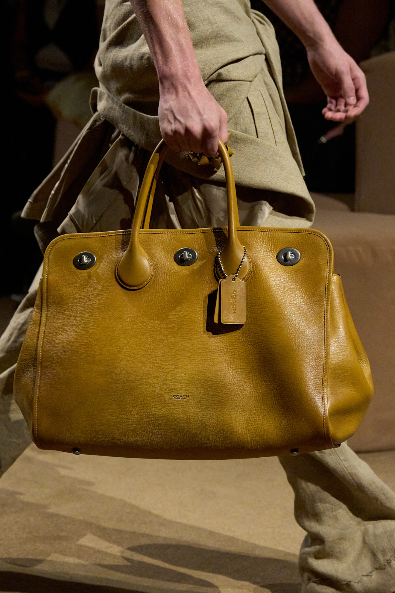 Coach's new Turnlock Tote Bag on the Spring 2027 runway at New York Fashion Week
