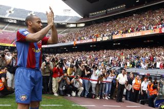 Thierry Henry meets the Barcelona fans at Camp Nou after signing from Arsenal in June 2007.