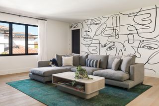A handpainted mural in a living room