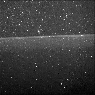 This is the first view ever taken from inside Jupiter's rings, snagged by Juno's Stellar Reference Unit camera during its first science encounter with the planet on Aug. 27, 2016. The three stars of Orion's Belt can be seen in the lower right, and Betelgeuse shines just above the rings.