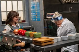 Gail has a conversation with Mary in the kitchen at the Woolpack