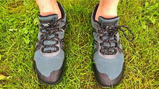 Man wearing Xero Mesa Trail WP lightweight running shoes
