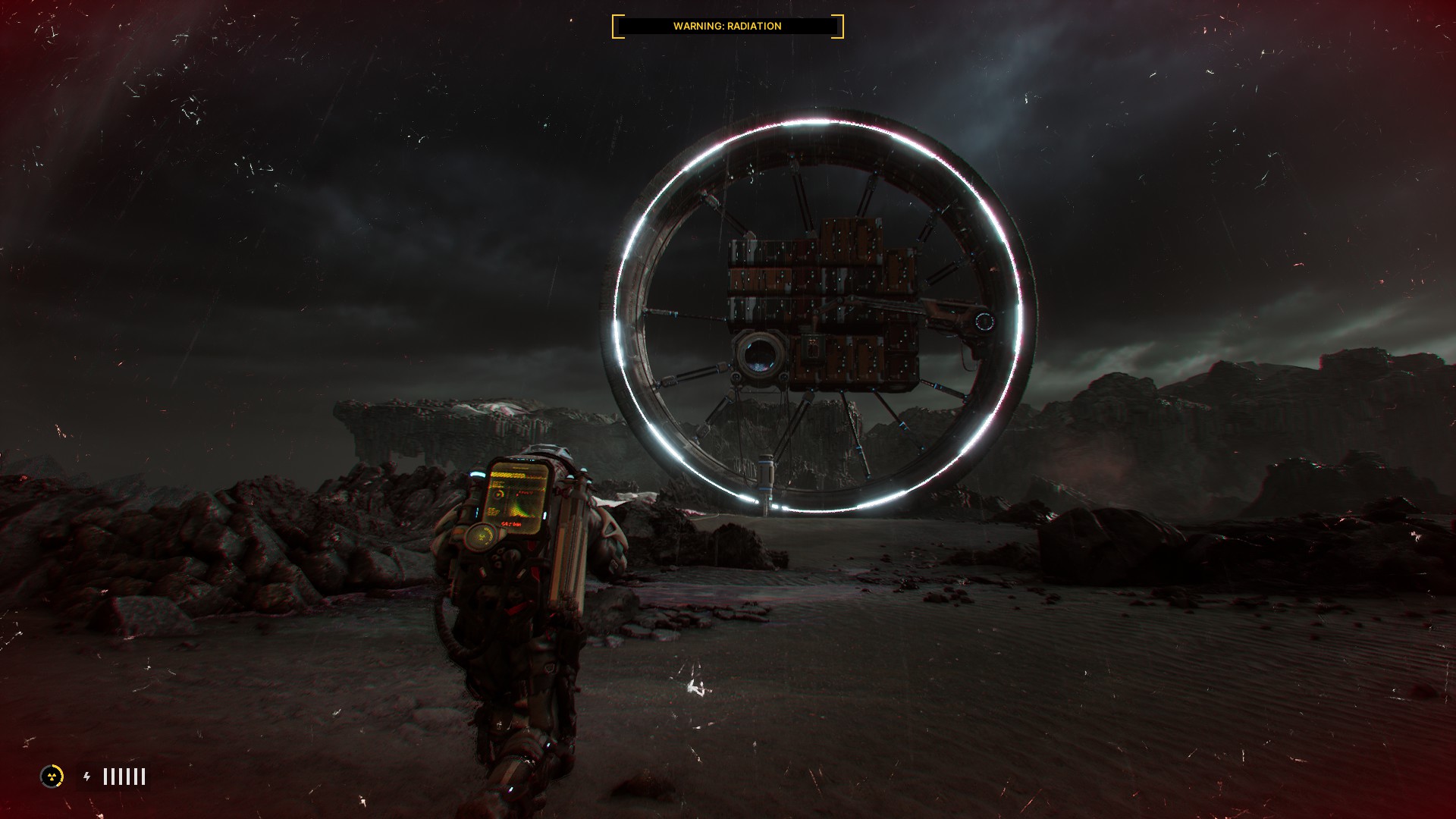Jan run towards the wheel base in The Alters as he soaks up radiation