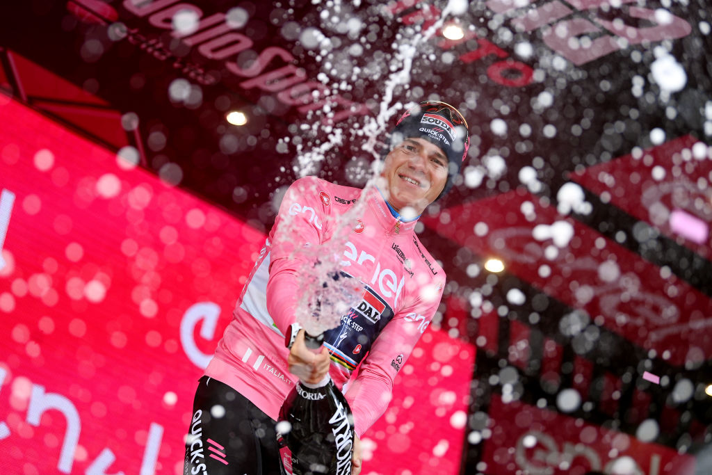 CESENA ITALY MAY 14 Remco Evenepoel of Belgium and Team Soudal Quick Step celebrates at podium as Pink Leader Jersey winner during the 106th Giro dItalia 2023 Stage 9 a 35km individual time trial stage from Savignano sul Rubicone to Cesena UCIWT on May 14 2023 in Cesena Italy Photo by Tim de WaeleGetty Images