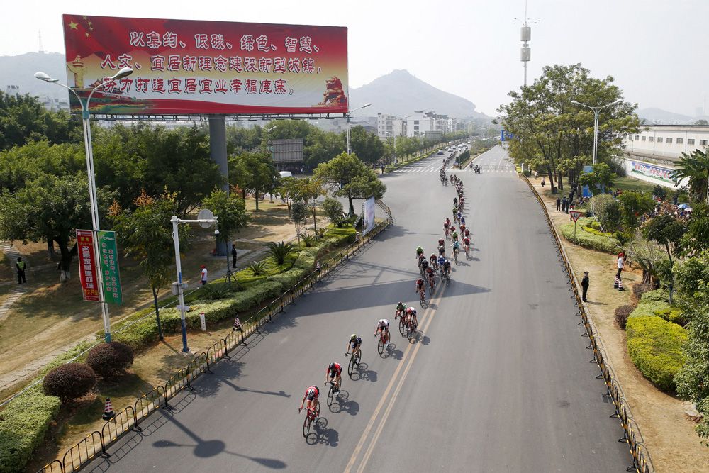 The peloton was lined out as riders tried to get in the break of the day