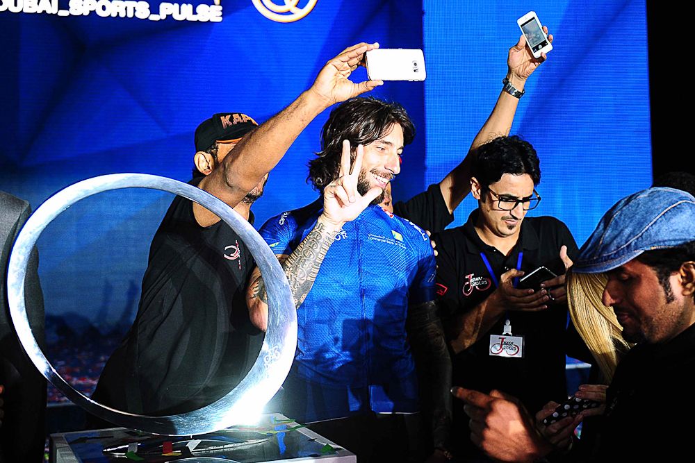 Fans gets selfies with performer Vittorio Brumotti